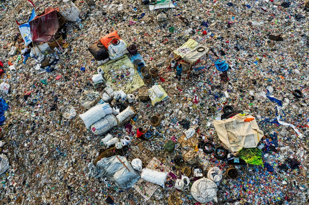 pexels photo 3174345 3174345 An aerial shot capturing the cluttered expanse of a landfill, showcasing pollution and waste management.